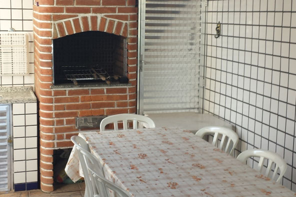 Área gourmet com churrasqueira premium para confraternização e lazer